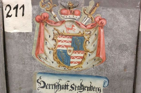 Bemalter Buchdeckel mit Wappen